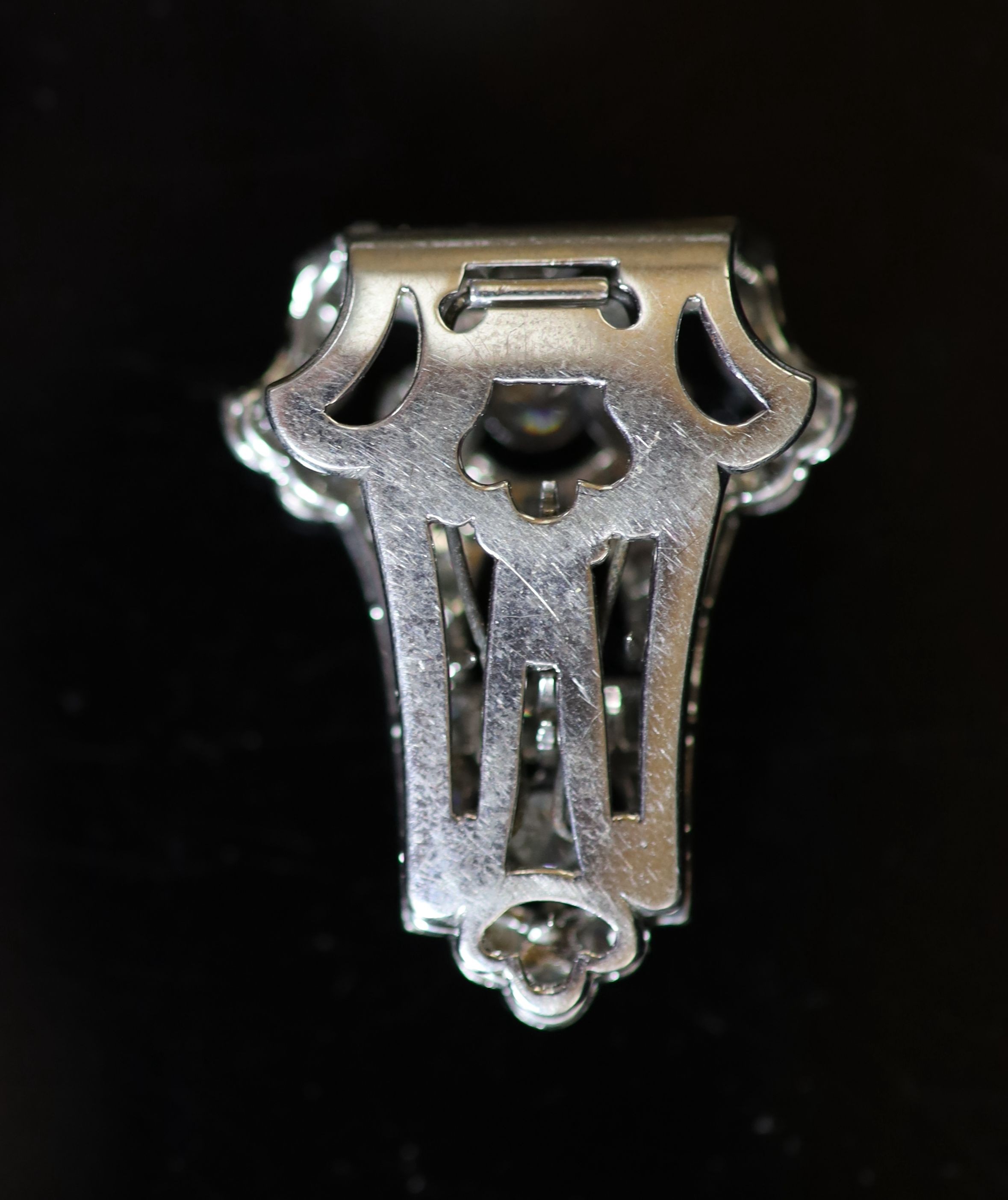 A 1920's/1930's Art Deco pierced platinum and diamond clip brooch